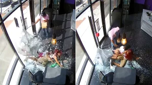 Dramatic footage shows an e-scooter rider ploughing through a shop's glass front - after hundreds of students descended on a Baltimore mall on their first day back.