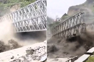 Terrifying footage shows a metal bridge swept away in seconds by a flash flood in India's Niti Valley, cutting off more than a dozen remote villages.