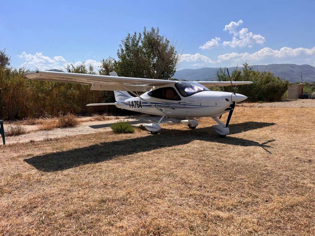 Two lawyers who went missing after their ultralight aircraft vanished shortly after take-off have been found dead - embracing inside the burned-out cockpit in remote Italian woodland.