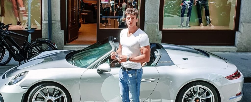 A reality star has died after losing control of a classic Porsche and careering off the road while filming an advert shoot on a mountain road in northern Italy.