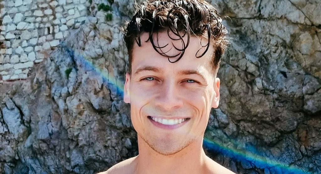 A reality star has died after losing control of a classic Porsche and careering off the road while filming an advert shoot on a mountain road in northern Italy.