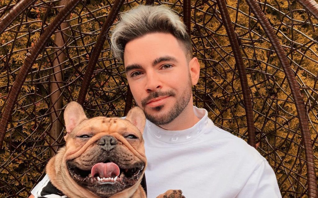 A British YouTuber with millions of fans has been filmed in handcuffs after being extradited to Poland over alleged sexual offences involving girls under 15.