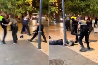 Moment security guard appears to unleash MMA-style beating on two men in tourist hotspot
