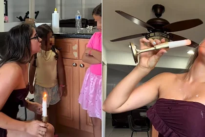 A mum has been arrested after videos allegedly showed her pouring melted candle wax onto her young daughters and setting fire to clothing inside their home.
