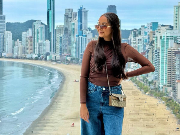 A mum-of-three influencer has died aged 33 after developing complications following plastic surgery - leaving her husband to raise their three young boys alone.