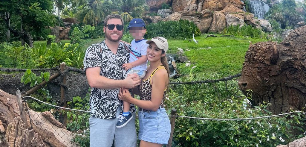 A mum-of-two has been found dead in a car boot after her estranged husband allegedly answered the door to police with blood on his shirt.