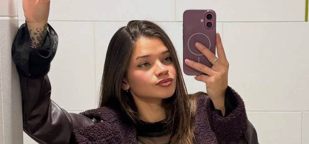 A nail technician has been arrested for stabbing her boyfriend to death after posting chilling messages online - including one about where to stick the knife.