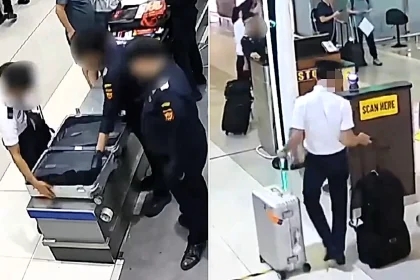 A pilot has been arrested at an airport after allegedly trying to smuggle 57lb of ecstasy and a small amount of methamphetamine hidden inside his luggage.