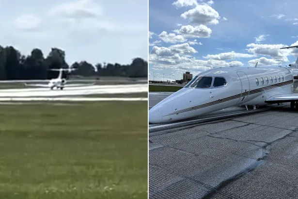 A plane was forced into a dramatic emergency landing after its nose gear failed to deploy - with fire crews lining the runway ready for the worst.