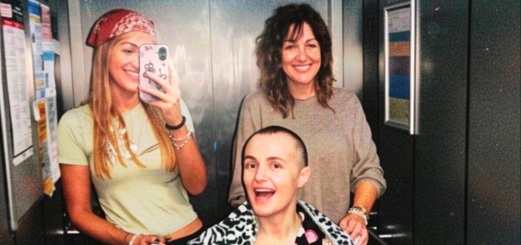A champion boxer has flown home to the UK after suffering a bleed on the brain during sparring - with fans raising more than £97,000 to bring her back.