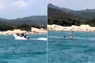 Shocking footage shows the moment a speeding migrant boat ploughed into a 17-year-old swimmer - before allegedly fleeing towards the coast.