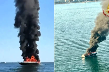 Ten people including a child were evacuated from a 20-metre yacht after a massive fire engulfed it - with a passing boater racing in to rescue them.