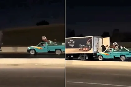Wild footage shows suspected thieves raiding a moving lorry from the bonnet of a speeding pickup in Egypt - with viewers comparing it to a Fast & Furious stunt.
