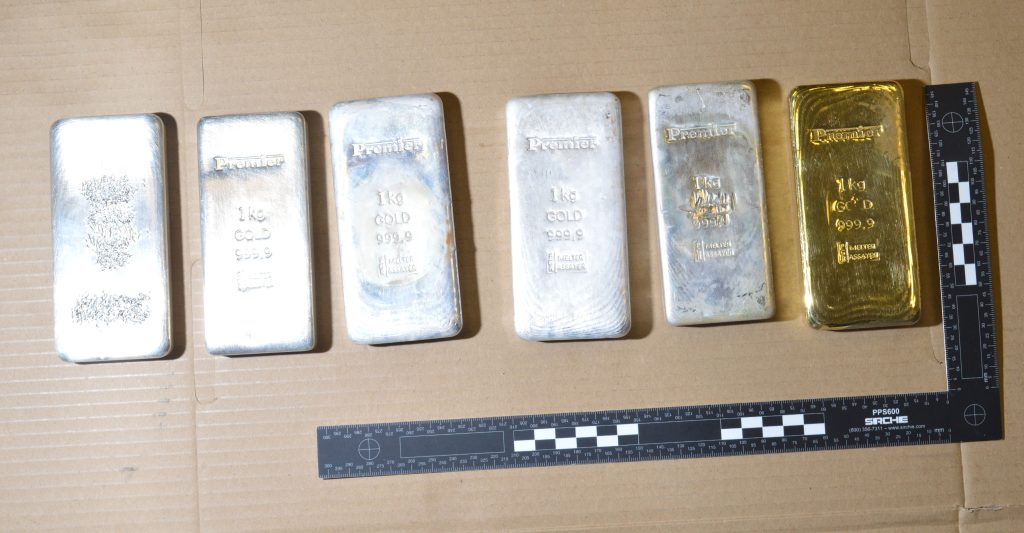 Three convicted money launderers are on the run after being sentenced in their absence over a staggering £266million operation - the biggest in UK legal history.