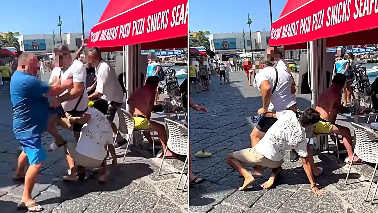 Tourists and shop owners were filmed trading punches, kicks and swinging chairs during a furious daylight brawl at a posh Italian holiday hotspot.