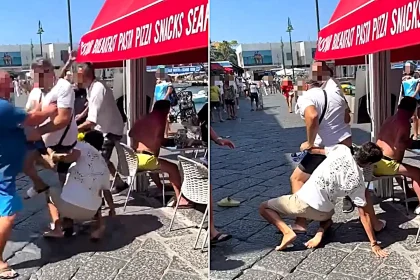 Tourists and shop owners were filmed trading punches, kicks and swinging chairs during a furious daylight brawl at a posh Italian holiday hotspot.