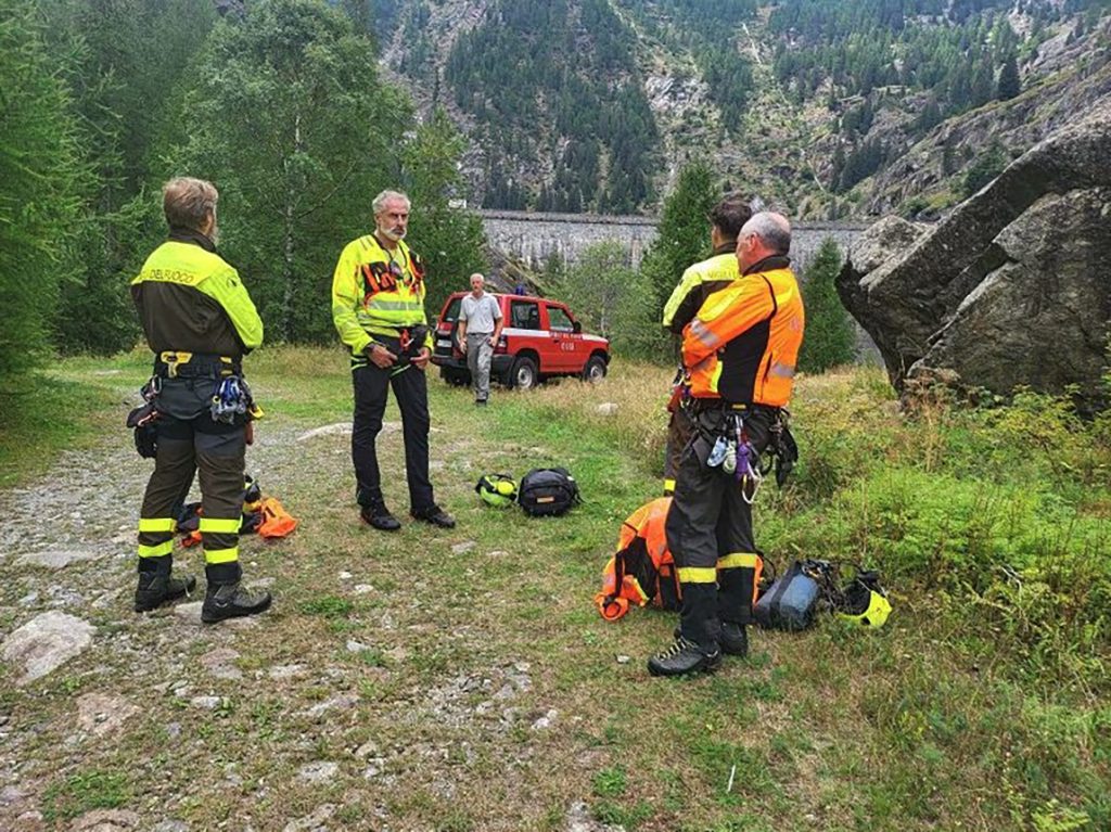 A two-seater gyrocopter erupted into a fireball after hitting cableway wires, killing both people on board - with the crash witnessed by the pilot's brother.