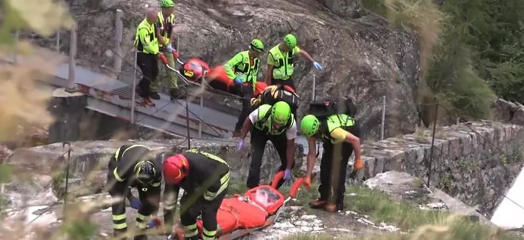 A two-seater gyrocopter erupted into a fireball after hitting cableway wires, killing both people on board - with the crash witnessed by the pilot's brother.