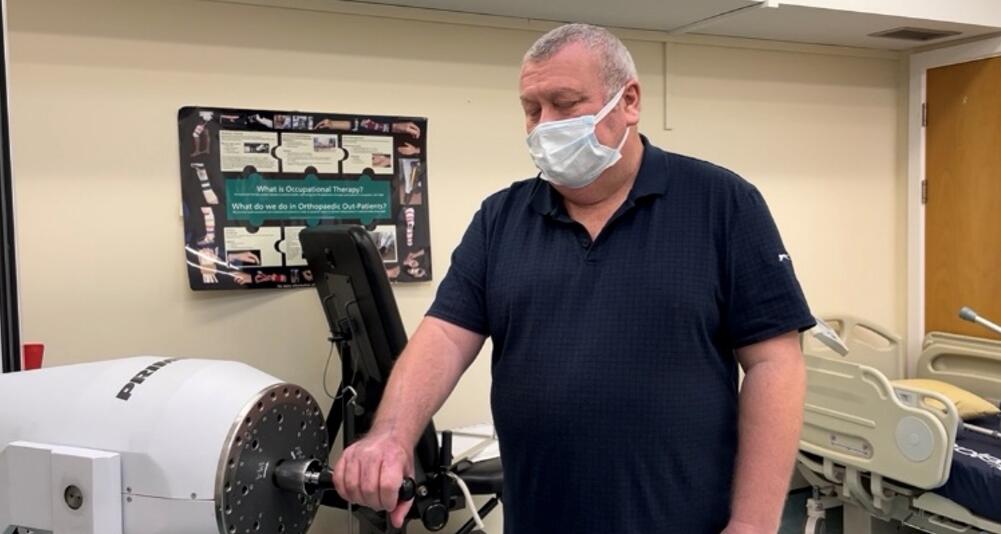 Man left in a coma for four days after a spider bite gave him a flesh-eating bug says the near-death ordeal helped him turn his life around - going on to shed almost seven stone.