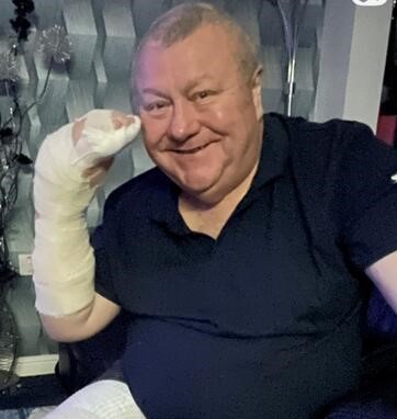 Man left in a coma for four days after a spider bite gave him a flesh-eating bug says the near-death ordeal helped him turn his life around - going on to shed almost seven stone.