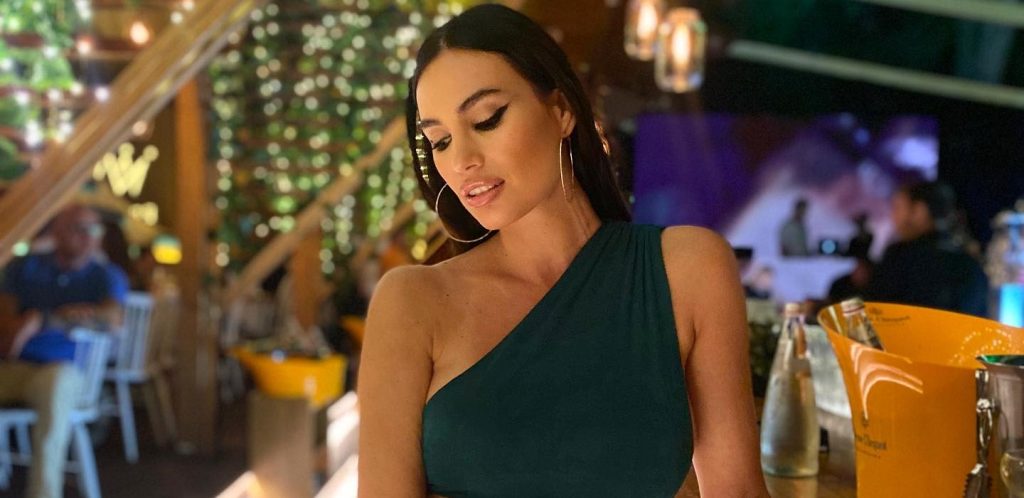 A model, actress and singer has broken down in tears and appealed for prayers after revealing she has six tumours, with the disease spreading to her bones.