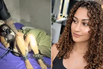 A young woman has been rescued after allegedly being chained to a bed and gagged for four days by her ex-husband - with police finding her struggling to breathe.