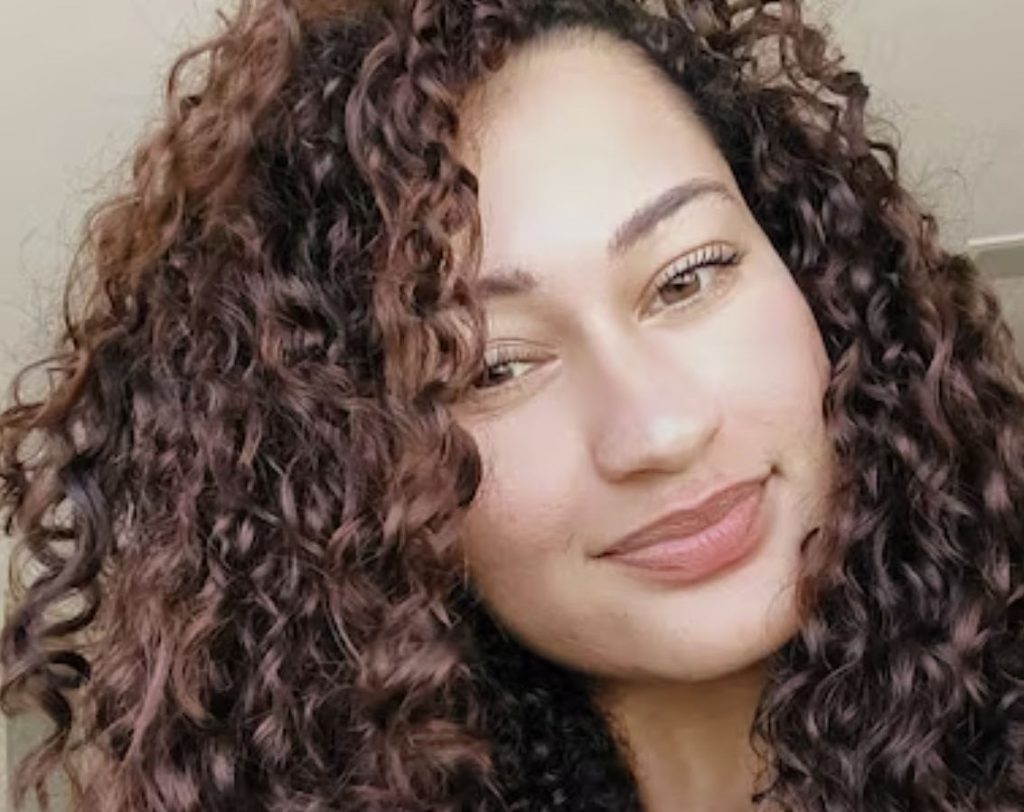 A young woman has been rescued after allegedly being chained to a bed and gagged for four days by her ex-husband - with police finding her struggling to breathe.