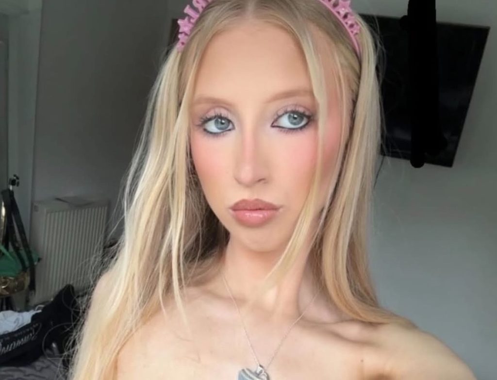 Woman, 20, faces years of surgery after a dog she had known since it was a puppy latched onto her face - she says the attack lasted just ten minutes.
