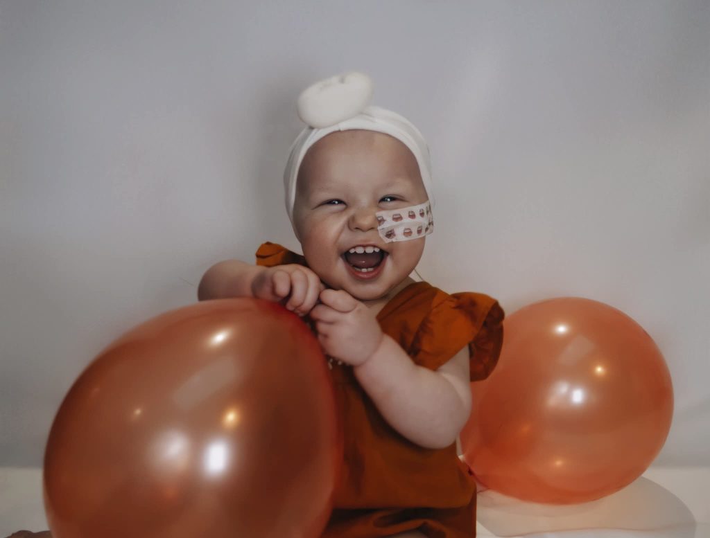 Grieving mum whose baby daughter's swollen tummy turned out to be aggressive stage 4 neuroblastoma urges parents to always trust their instincts - after losing Nellie aged 14 months.