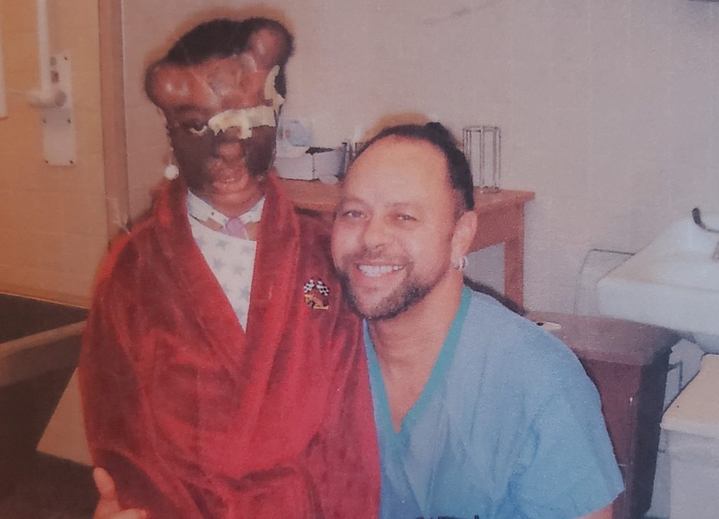 Man who grew up sleeping beside his dogs reveals the horror moment two pitbulls mauled his face - leaving him without his nose and ears after a 26-hour surgery.