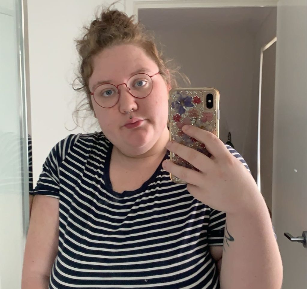 Woman who weighed 14 stone before the age of 10 says shedding 15 stone unlocked pretty privilege - with strangers now nicer and men rushing to hold doors open for her.