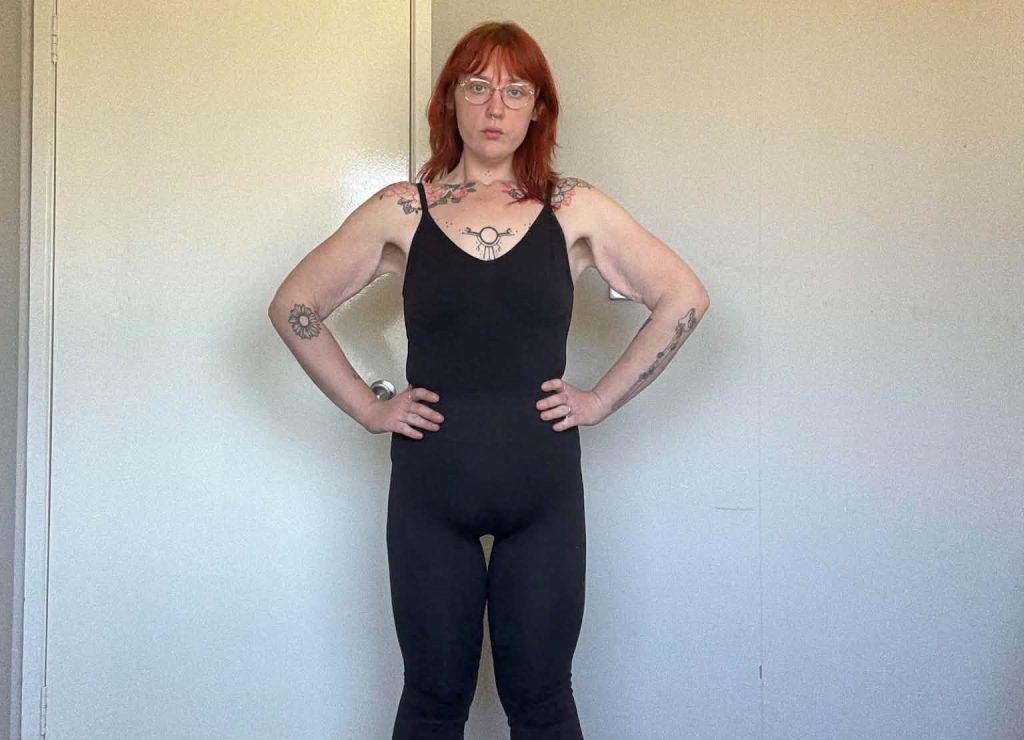Woman who weighed 14 stone before the age of 10 says shedding 15 stone unlocked pretty privilege - with strangers now nicer and men rushing to hold doors open for her.