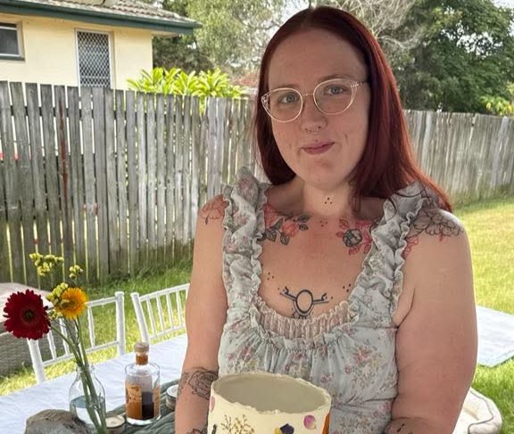 Woman who weighed 14 stone before the age of 10 says shedding 15 stone unlocked pretty privilege - with strangers now nicer and men rushing to hold doors open for her.