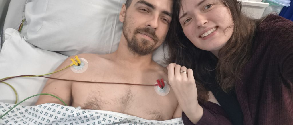Man became paralysed from the chest down within minutes of his legs tingling due to a rare spinal bleed - then found out a week later he was going to be a dad to a rainbow baby.
