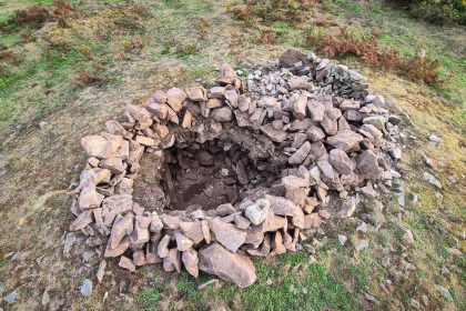 A 4,000-year-old Bronze Age burial mound has been vandalised after rocks were removed from the protected site - just two years after it was last repaired.