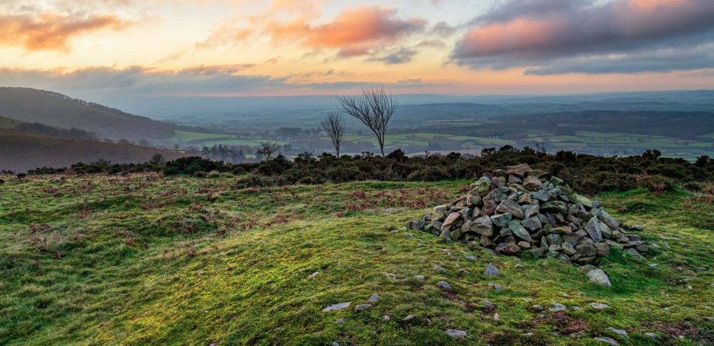 A 4,000-year-old Bronze Age burial mound has been vandalised after rocks were removed from the protected site - just two years after it was last repaired.