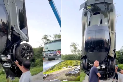 A £400,000 supercar has plunged 330ft into a valley after the driver allegedly forgot the handbrake - as he sprinted after it shouting: "I did apply it."