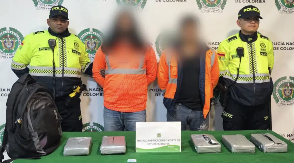 Two airport workers were caught on CCTV trying to smuggle 15lb of cocaine onto an international flight in Bogotá, Colombia - with the drugs stashed in their work lockers.