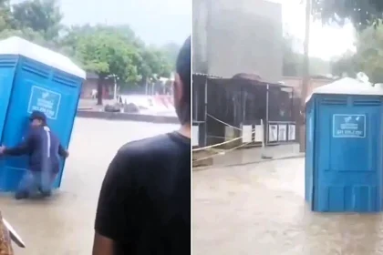 An unlucky bloke mid-poo was swept away when a flash flood sent his portable toilet careering down the street - with shouts for help heard coming from inside.