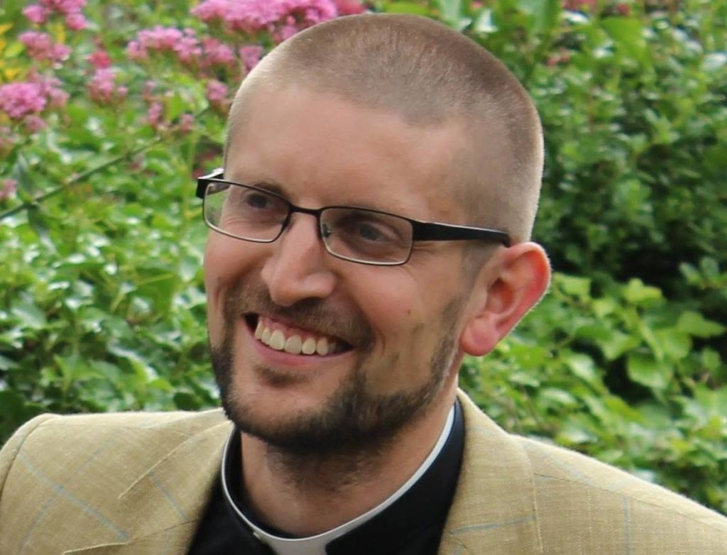 A body has been found in the search for a leading priest and professor who went missing while on a hillwalking holiday in the Cuillin mountains on the Isle of Skye.
