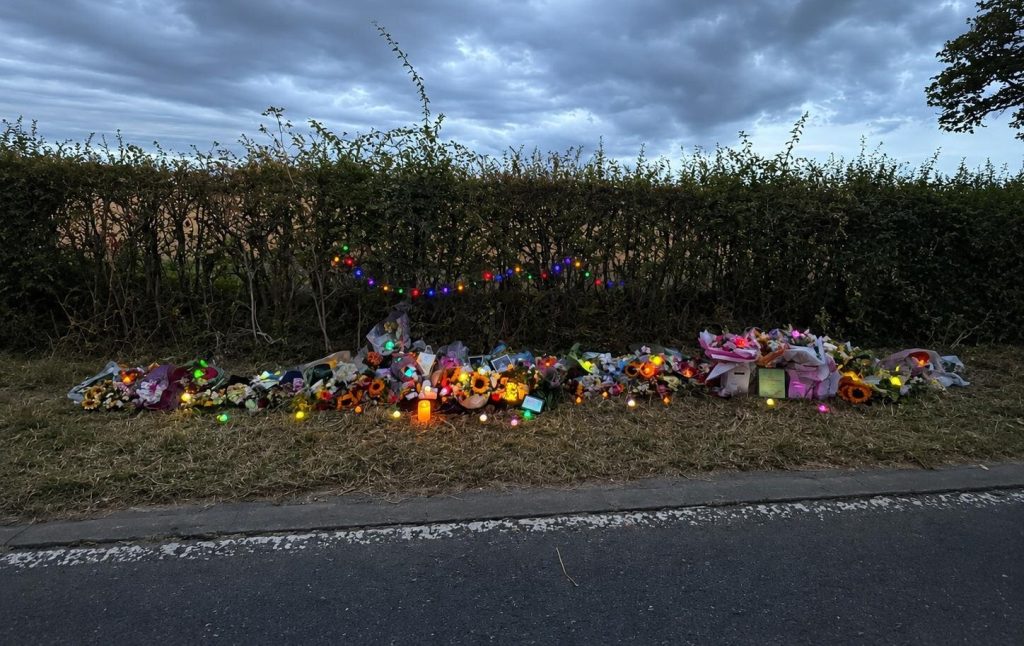 The family of nail technician Dolly Reed, 21, have been leaving lights at her roadside memorial so she 'isn't in the dark' after a horror crash killed her.