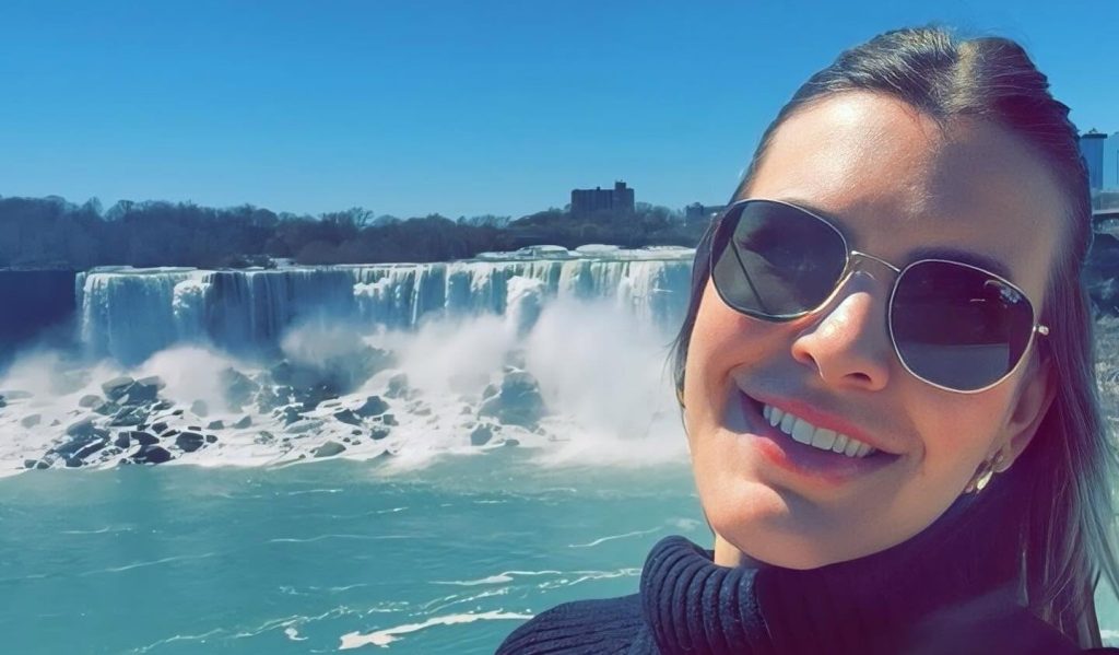 A doctor was found stabbed to death in her flat beside her eight-month-old son - after neighbours raised the alarm when they heard the baby crying for hours.