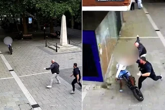 Dramatic footage shows a police officer tackling an e-bike rider to the ground in seconds after he allegedly failed to stop - during a city centre crackdown in Peterborough.