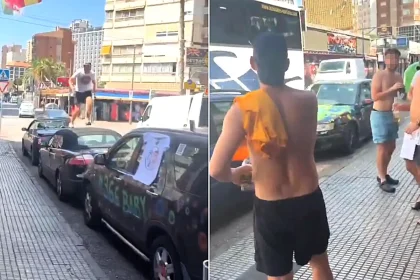 A sombrero-wearing "drunk Brit" was filmed sprinting across a row of parked cars in Benidorm - before smashing a windscreen with a flying two-footed kick.