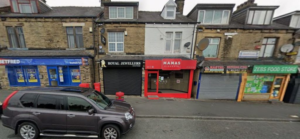 Two men have been charged after a bungled jewellery raid - with a security smoke system allegedly trapping them inside the shop until police arrived.