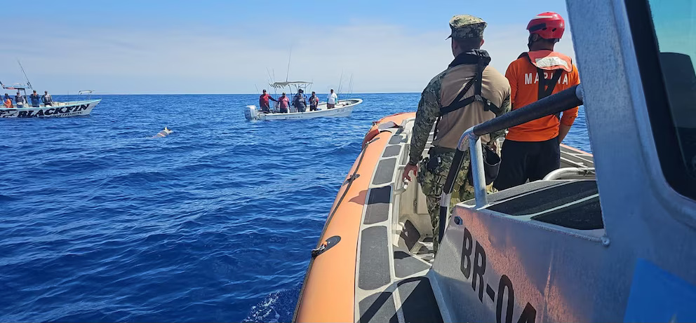 Fishermen hunting marlin off Mexico were stunned to find what looked like a live torpedo bobbing in the Pacific - and feared it would explode if touched.