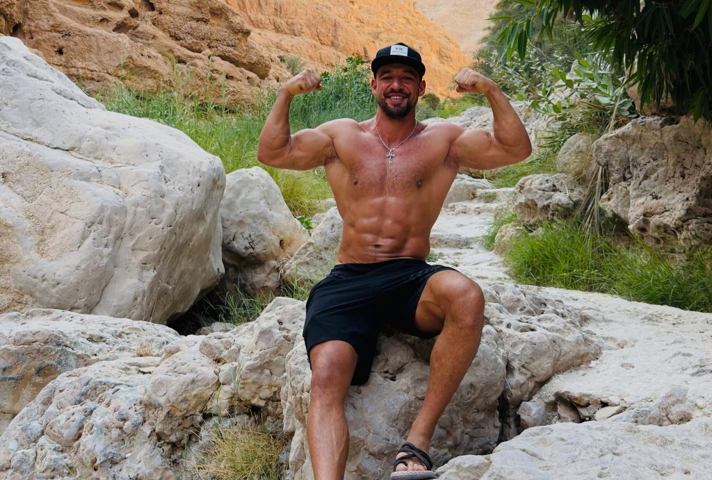 Fitness influencer Vadym Oleynik sparks fury after appearing to ride a sea turtle while it laid eggs in Oman - now authorities have taken legal action against him.