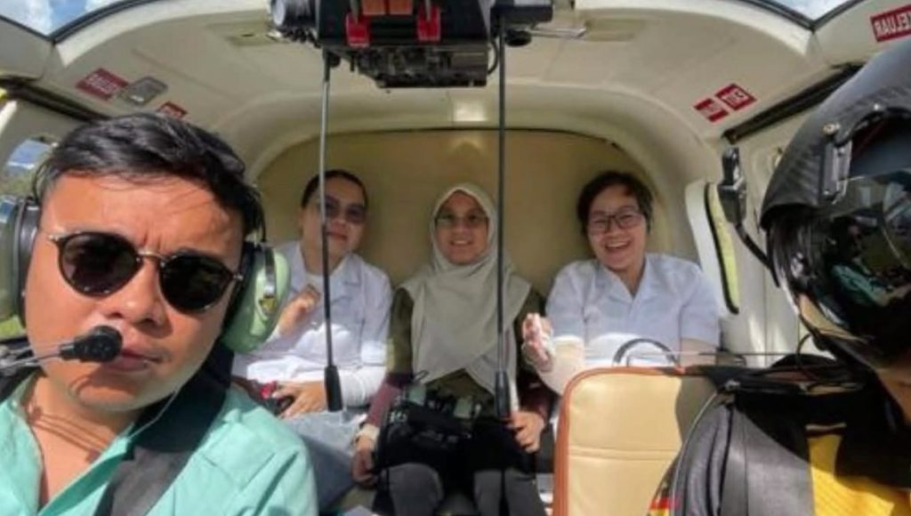 Five people have died after a Flying Doctor helicopter appeared to burst into flames mid-air before crashing near a remote airstrip - as footage shows the horror.