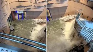 Dramatic footage shows floodwater cascading down a staircase like a waterfall after 104mm of rain battered Nagoya in just one hour - forcing 2,700 to flee.
