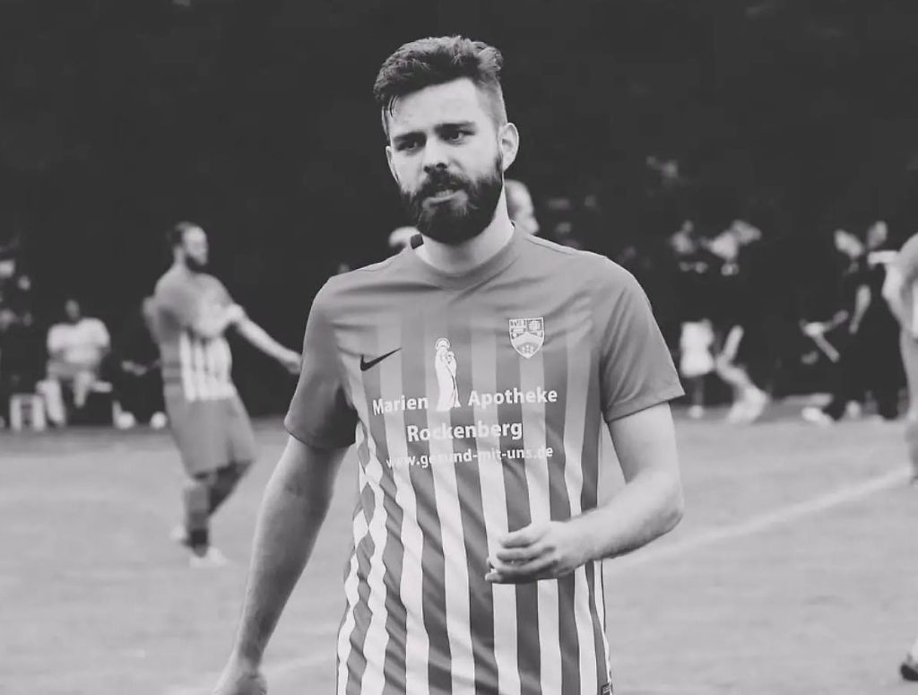 A footballer has been arrested two weeks before his wedding on suspicion of poisoning his teammate on a squad trip - prosecutors believe it was an act of revenge.